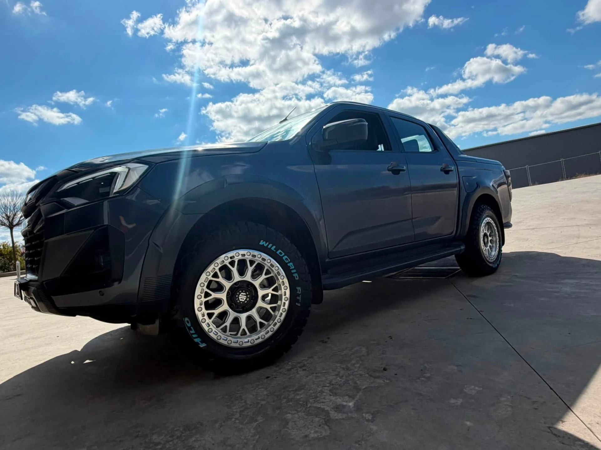 Finished dual cab ute on new alloy wheels and all-terrain tyres outside the Kelso workshop at Australia's Most Wanted Wheels and Tyres Bathurst